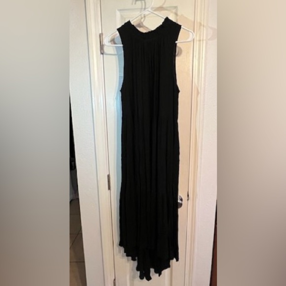 Sleeveless Black Dress with stand up ruffle neckline and high low hem